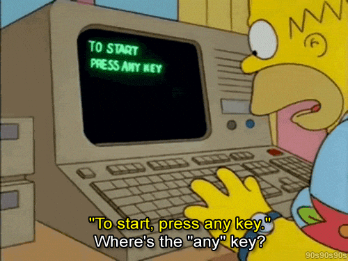 Confused Homer Simpson using computer GIF