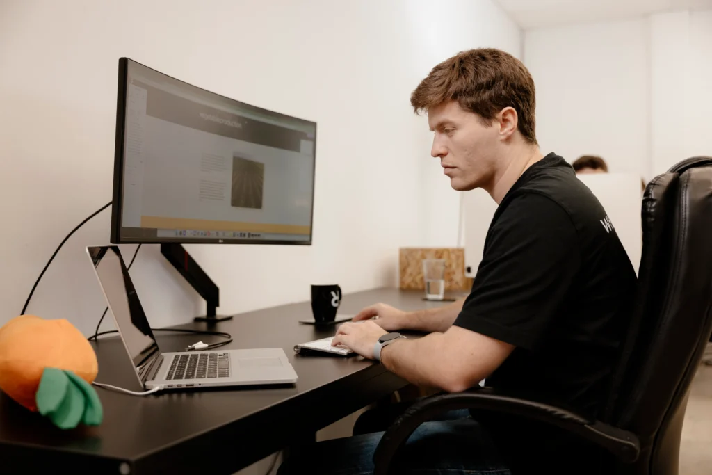 White Rabbit team member working at computer on email copywriting